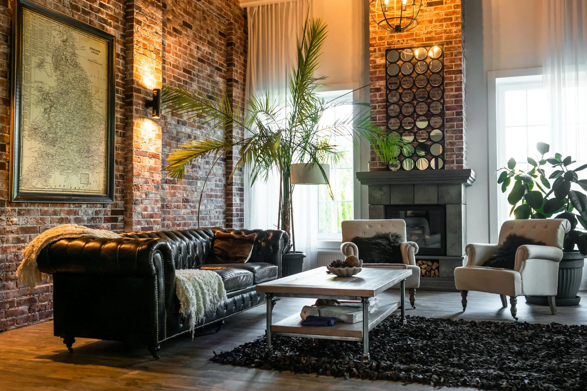 modern editorial living room idea: Industrial Edge with cream and warm neutrals with sage green and terracotta accents, designer-curated modern