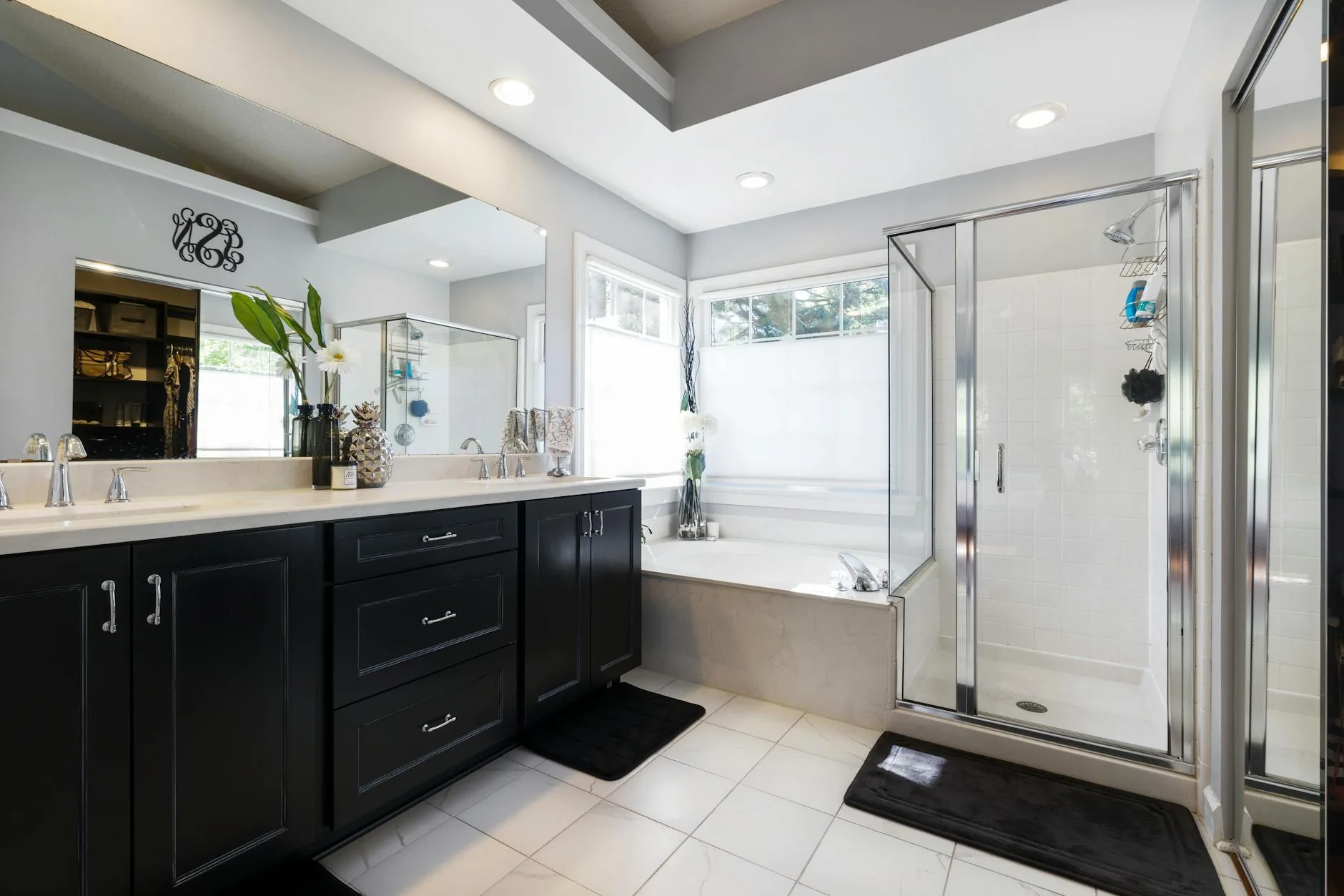 modern editorial bathroom idea: Light and Airy Coastal with cream and warm neutrals with sage green and terracotta accents, designer-curated