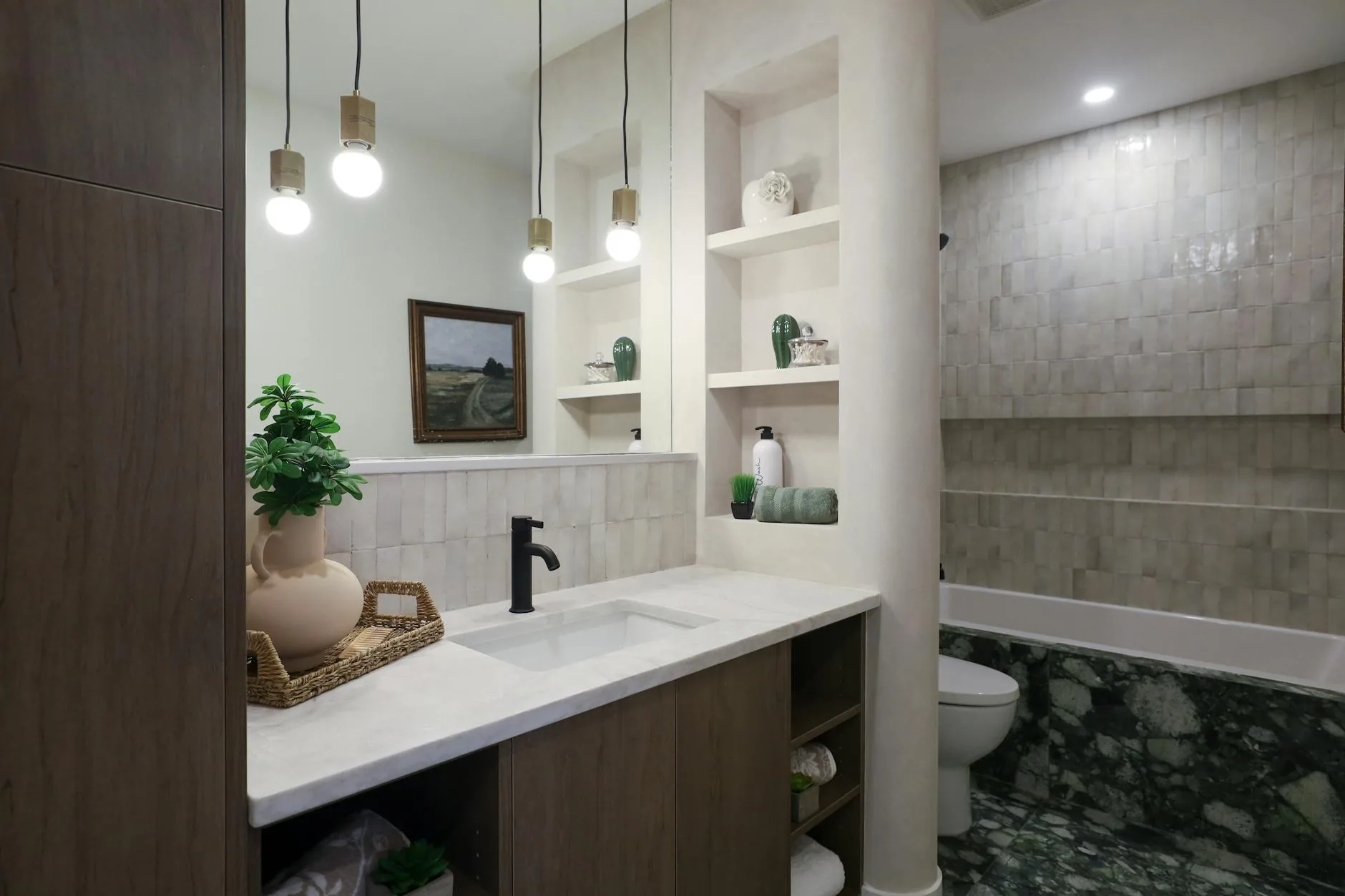 modern editorial bathroom idea: Neo-Eclectic Mix with cream and warm neutrals with sage green and terracotta accents, designer-curated bathroom decor