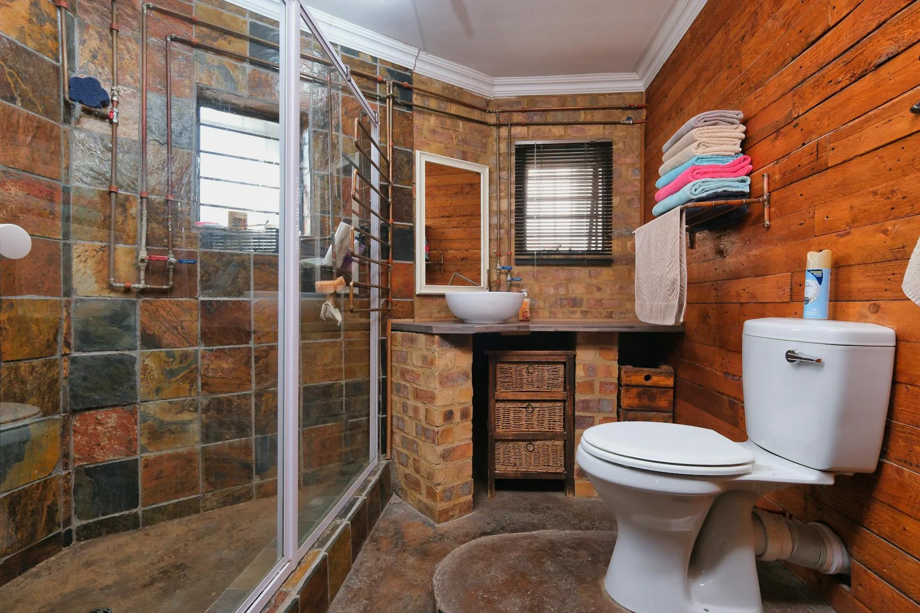 modern editorial bathroom idea: Step-by-Step: Creating a Rustic Retreat with cream and warm neutrals with sage green and terracotta accents,
