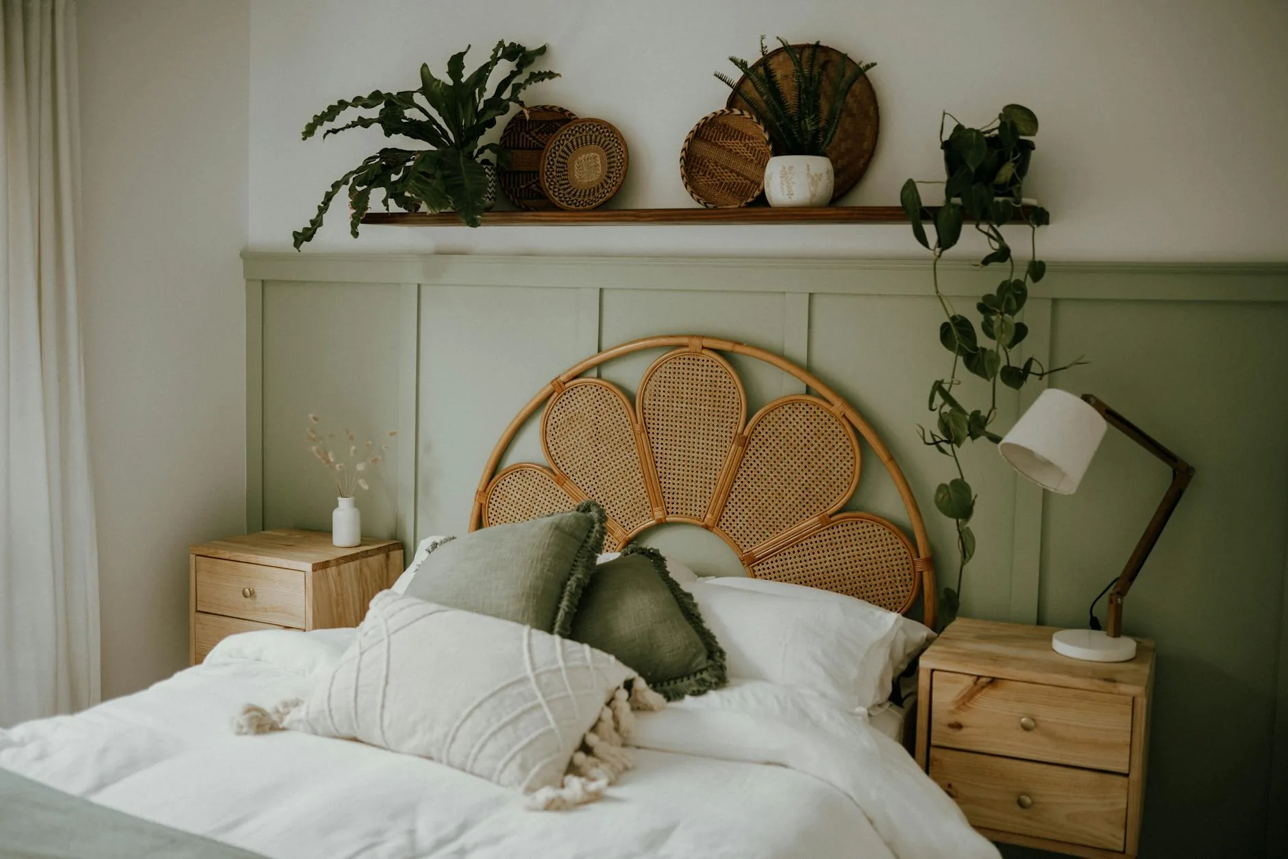 modern editorial bedroom idea: Eco-Friendly Bedding with cream and warm neutrals with sage green and terracotta accents, designer-curated modern bedroom
