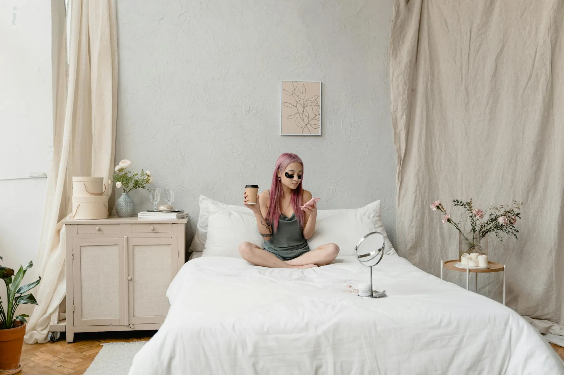 modern editorial bedroom idea: Minimalist Zen Oasis with cream and warm neutrals with sage green and terracotta accents, designer-curated modern