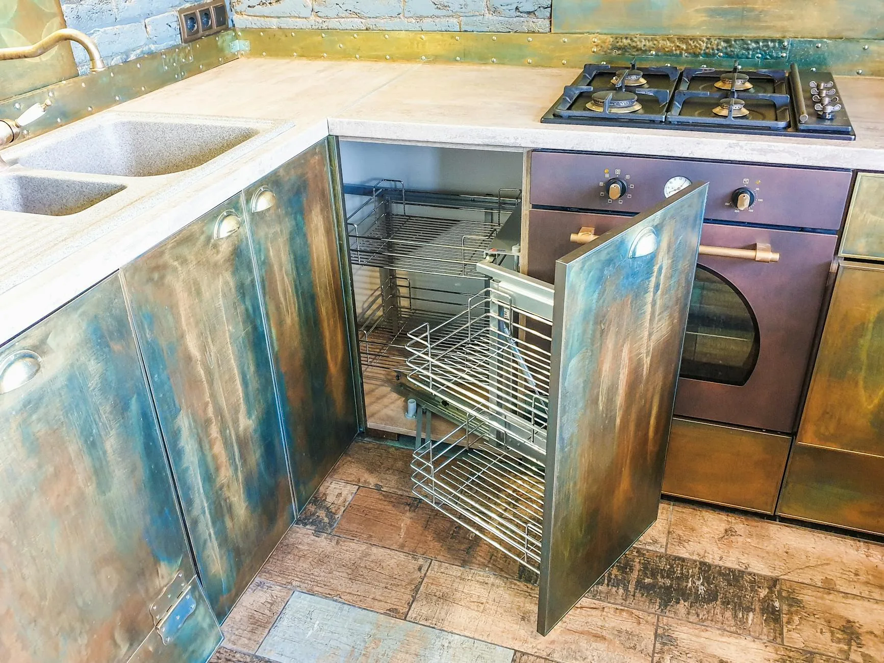 modern editorial kitchen idea: Concealed Storage Solutions with cream and warm neutrals with sage green and terracotta accents, designer-curated modern