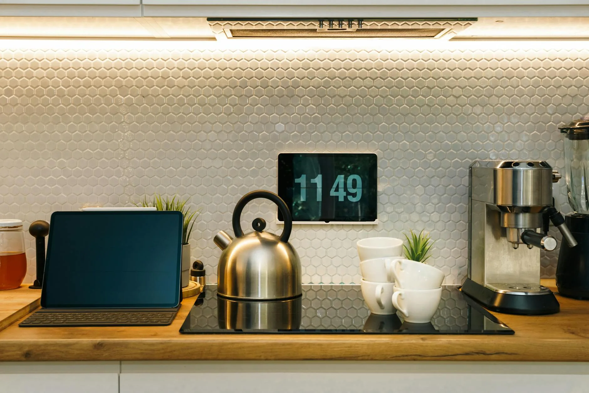 modern editorial kitchen idea: Smart Kitchen Gadgets with cream and warm neutrals with sage green and terracotta accents, designer-curated modern
