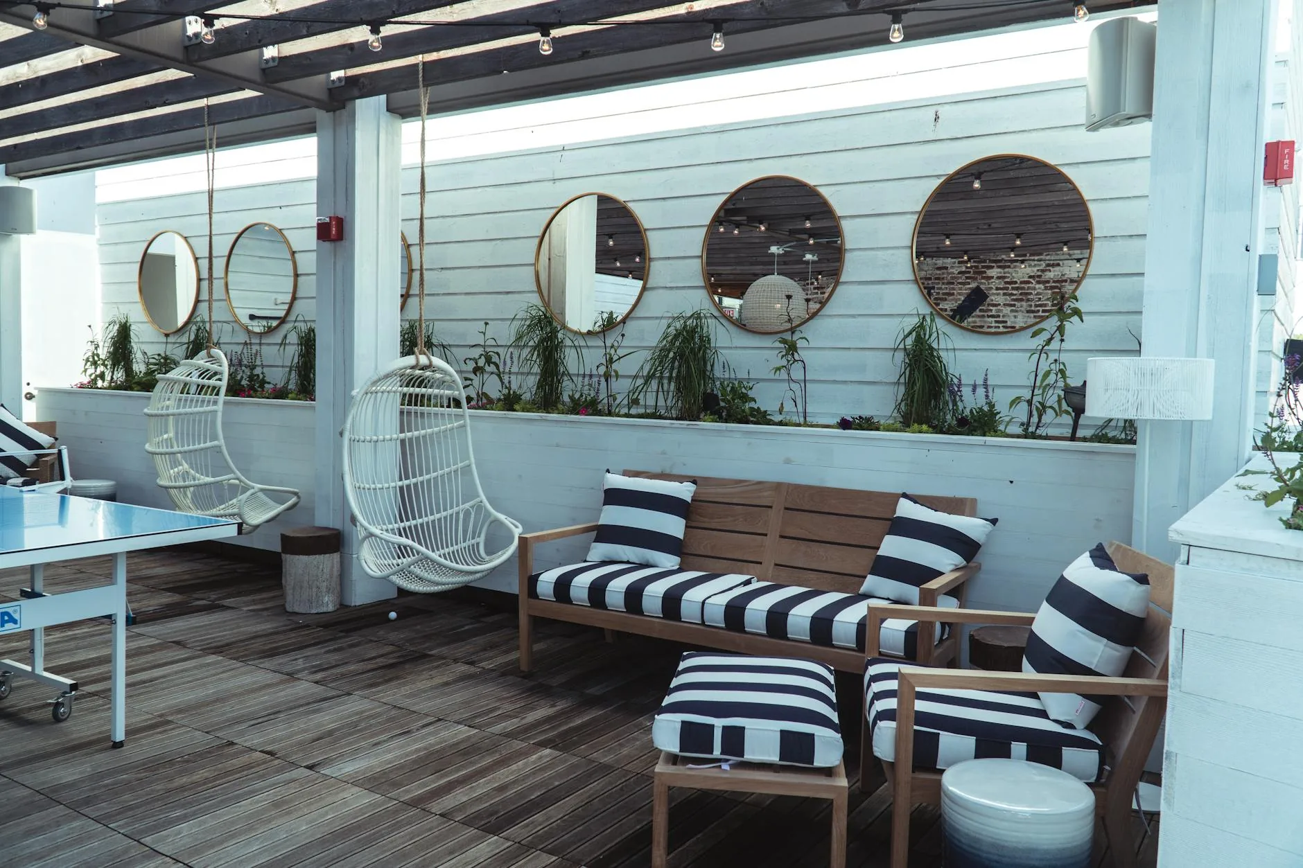 modern editorial outdoor space idea: Contemporary Pergolas with cream and warm neutrals with sage green and terracotta accents, designer-curated outdoor