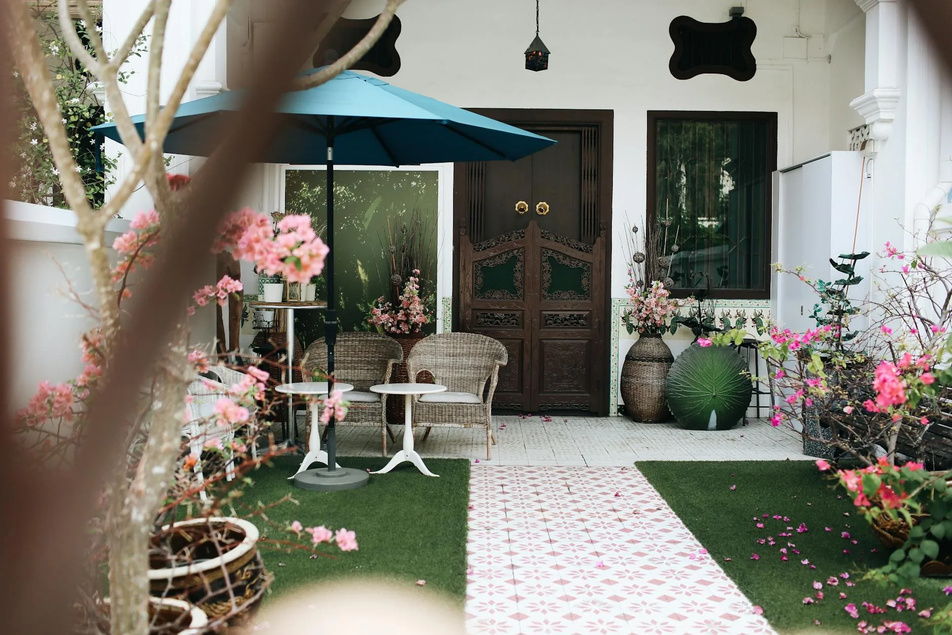 modern editorial outdoor space idea: Garden Mirrors with cream and warm neutrals with sage green and terracotta accents, designer-curated outdoor