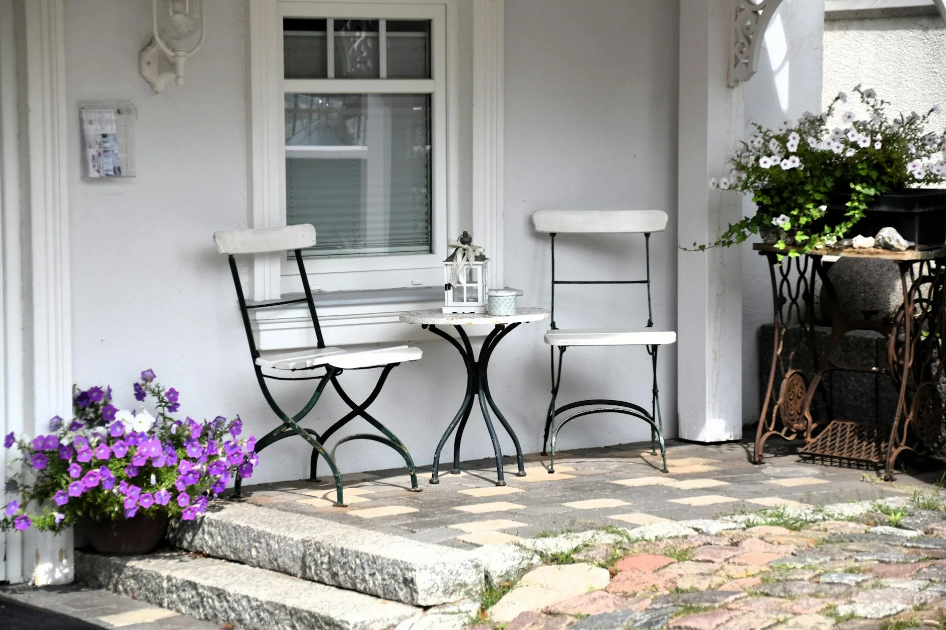 modern editorial outdoor space idea: Solar-Powered Lighting with cream and warm neutrals with sage green and terracotta accents, designer-curated outdoor