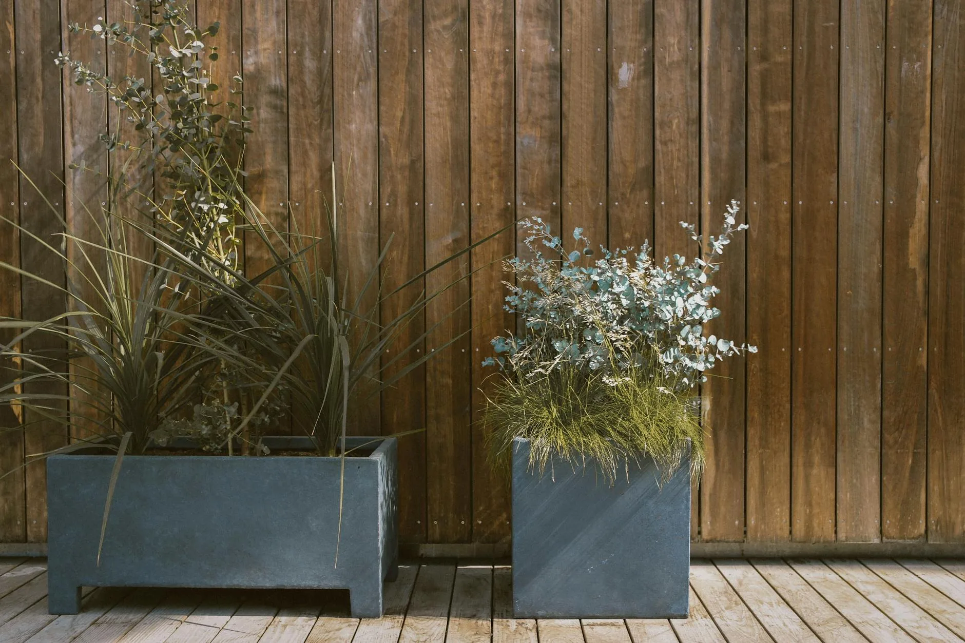 modern editorial outdoor space idea: Step-by-Step: DIY Planter Boxes with cream and warm neutrals with sage green and terracotta accents,